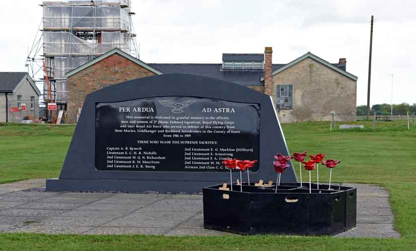 Memorial and original WWI buildings at Stow Maries